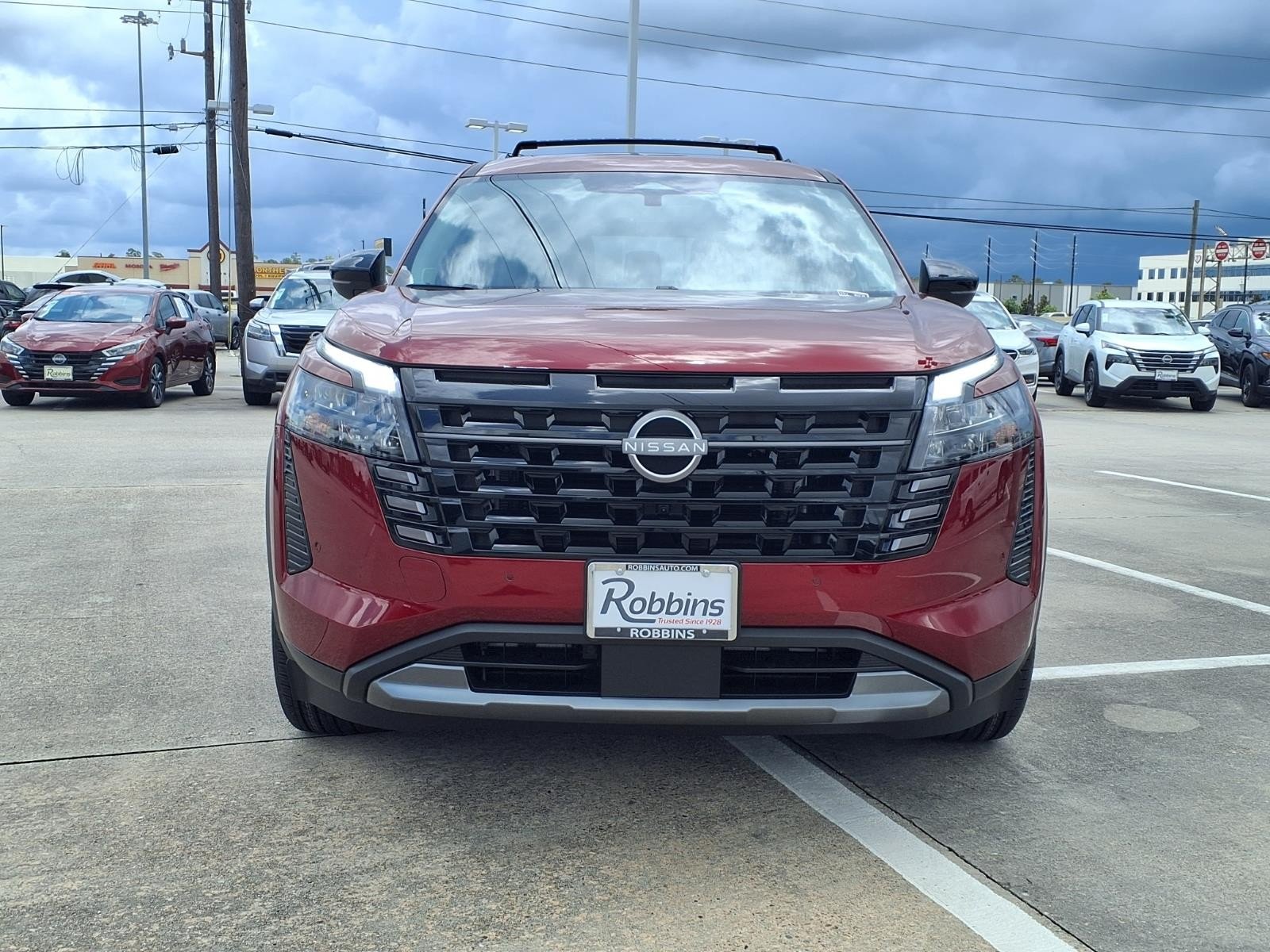 2026 Nissan Pathfinder Platinum Red at Robbins Nissan