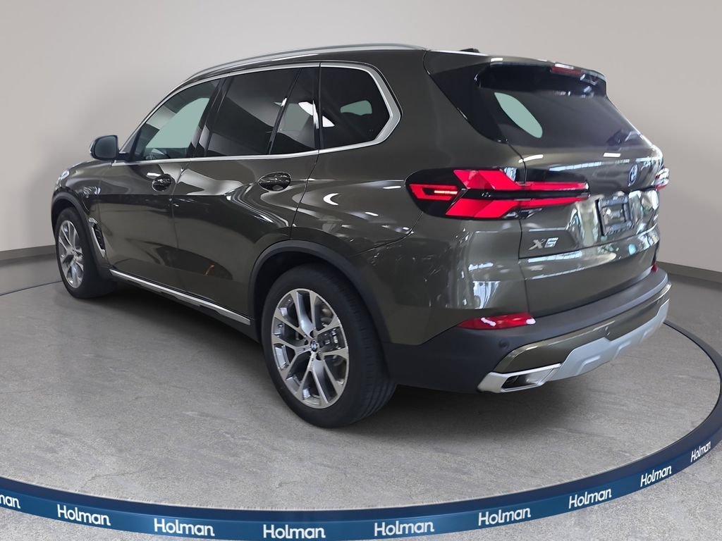 New 2026 Manhattan Green Metallic BMW xDrive50e image 7