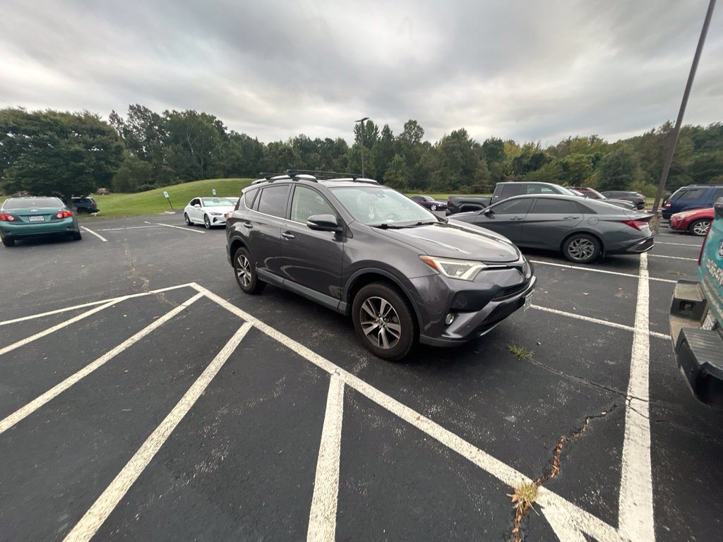 Used 2016 Gray Toyota XLE image 1