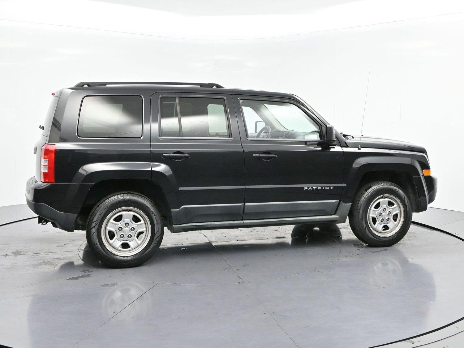 Used 2011 Brilliant Black Crystal Pearl Jeep Sport image 8