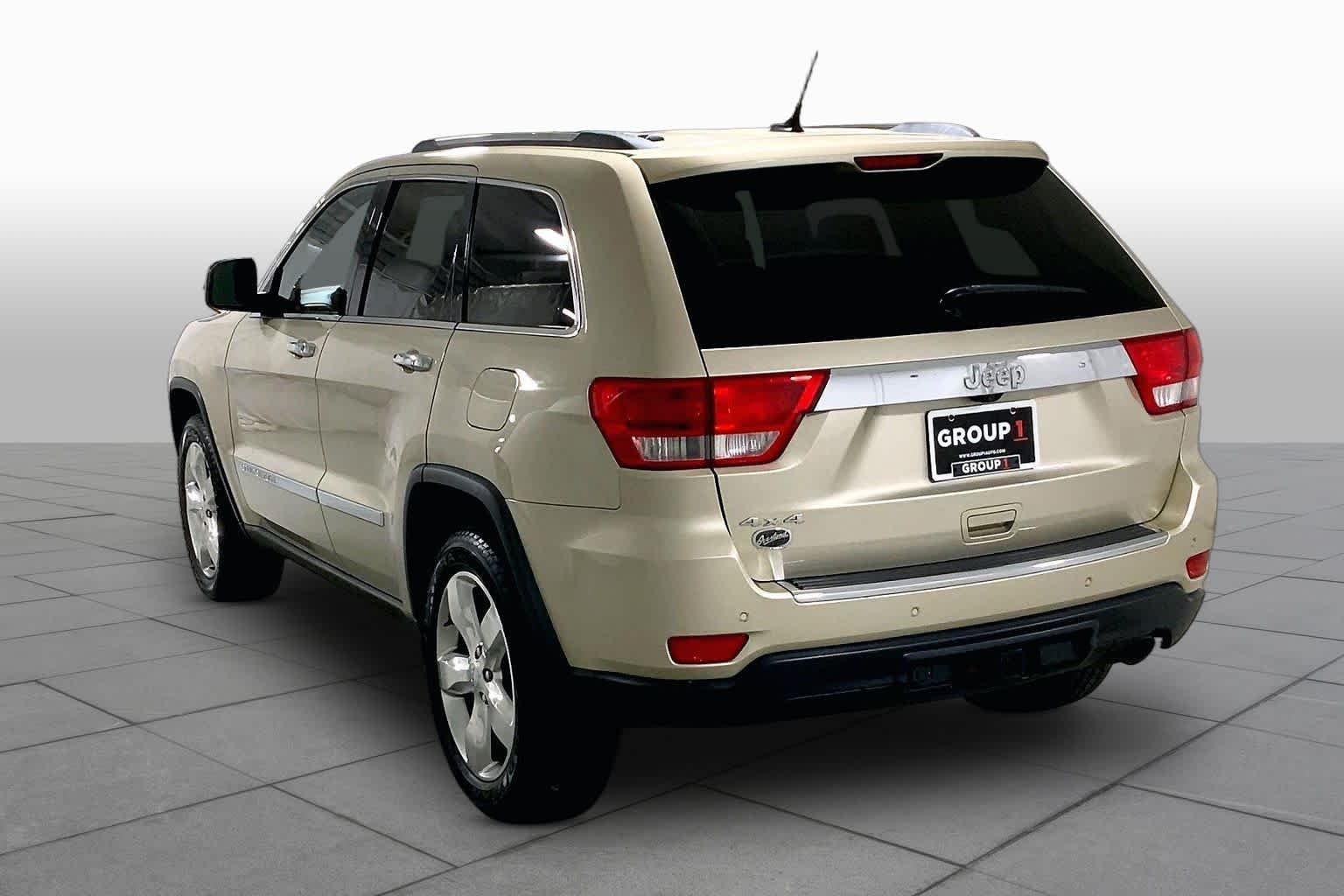 Used 2011 White Gold Jeep Overland Summit image 11
