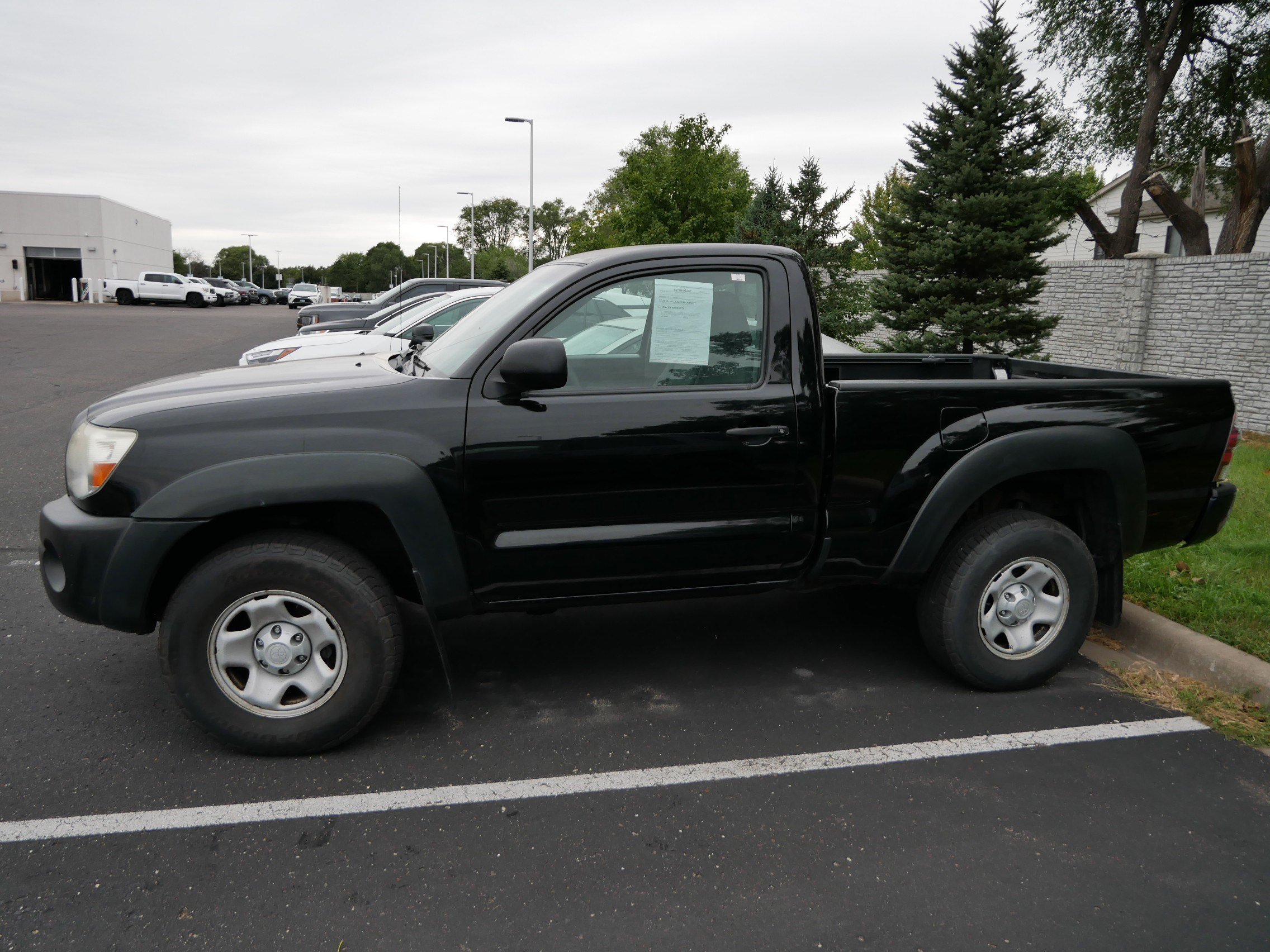 Used 2011 Black Toyota REG CAB 4WD AT image 3