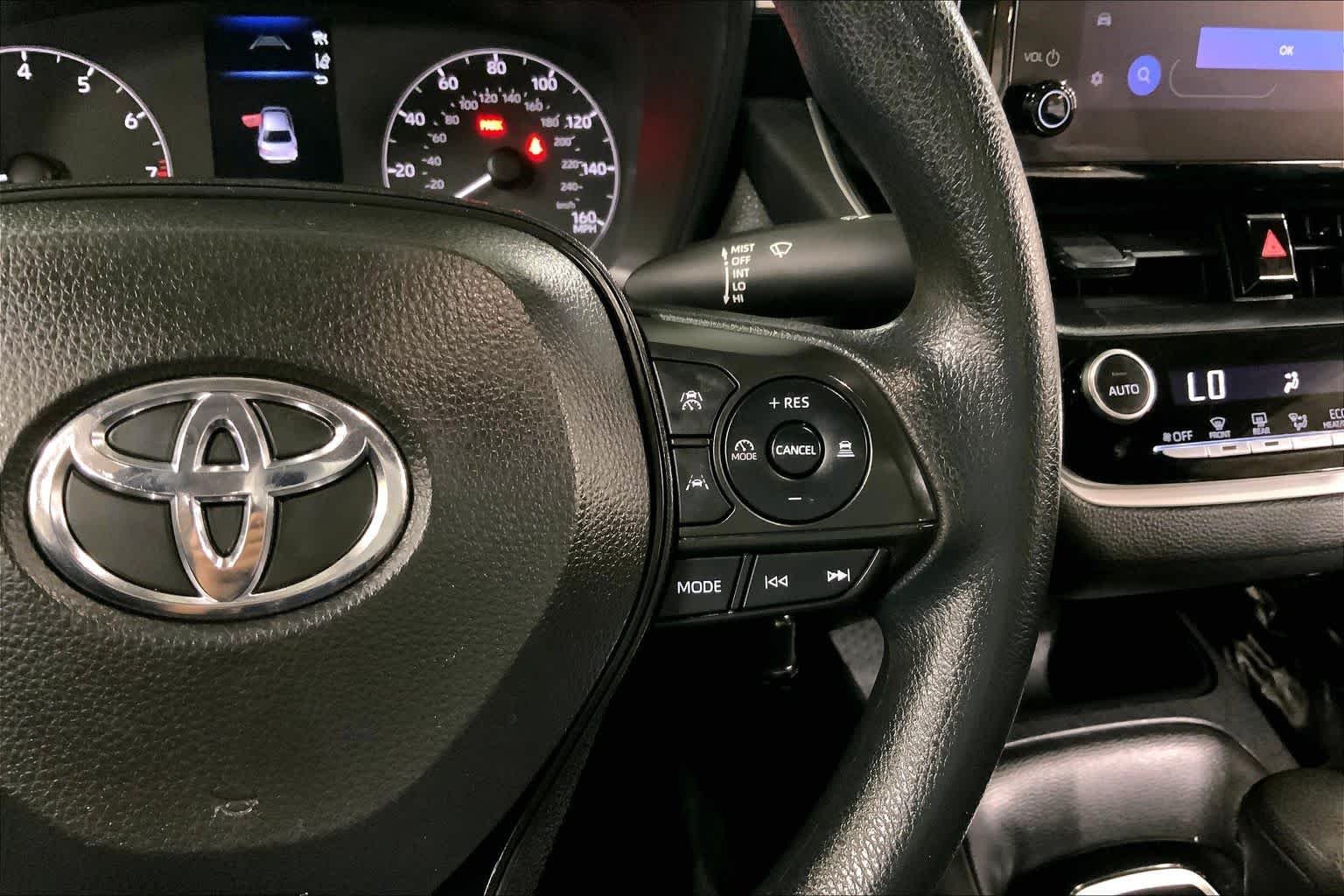 Used 2024 Midnight Black Metallic Toyota LE image 25