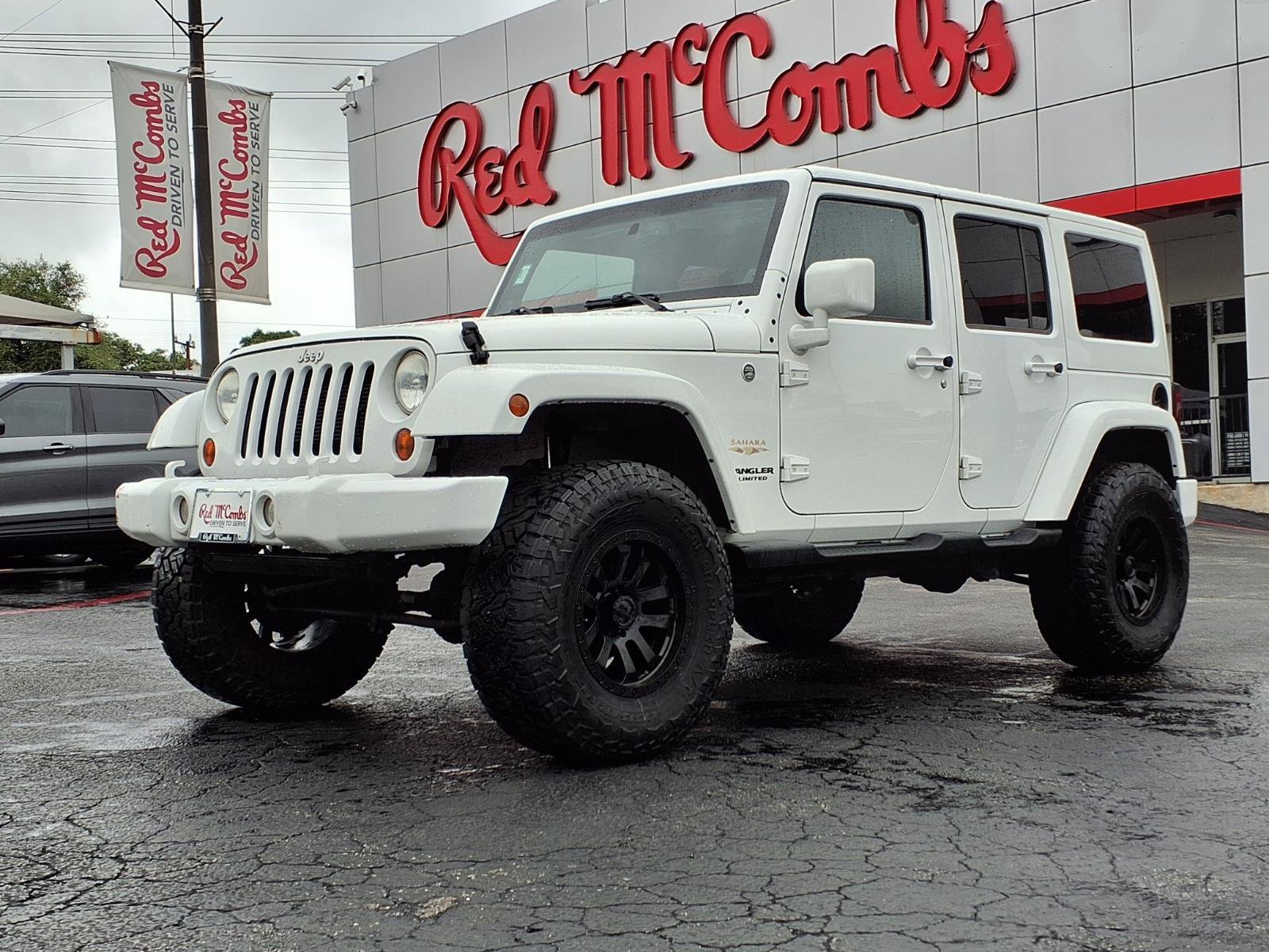 Used 2013 Bright White Jeep Sahara image 1