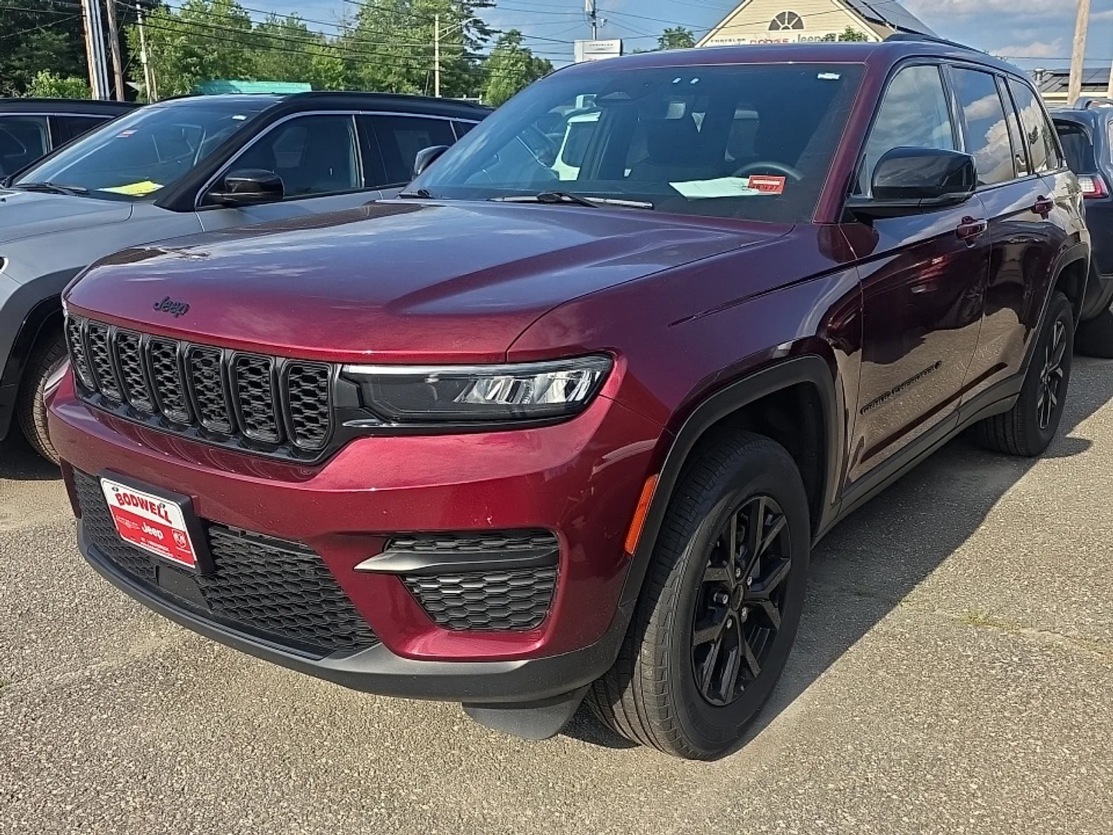 Certified Used 2024 Velvet Red Pearlcoat Jeep Altitude X 4x4 image 1