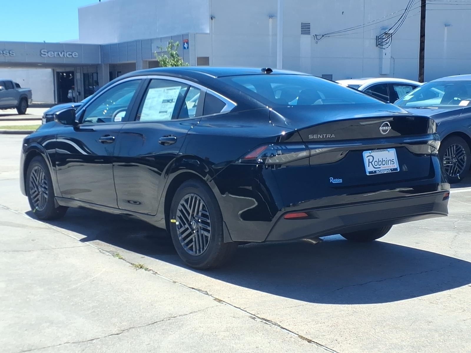 New 2026 Super Black Nissan SV image 7