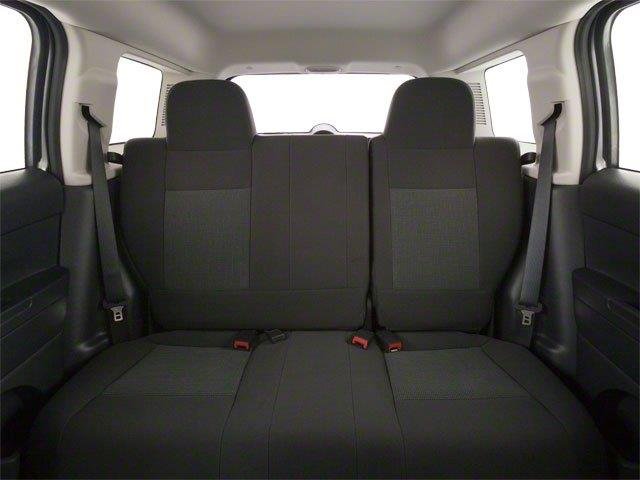 Used 2013 Deep Cherry Red Crystal Pearl Jeep Sport image 8