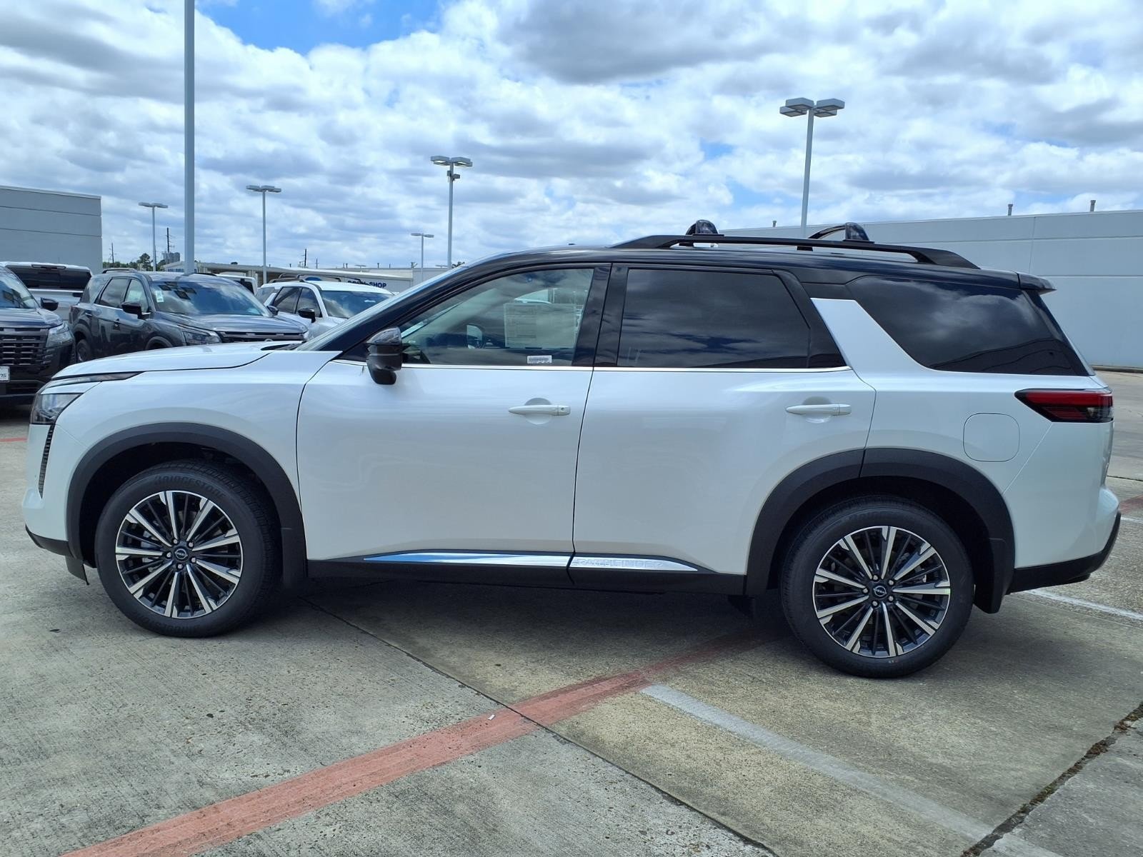2026 Nissan Pathfinder Platinum White at Robbins Nissan