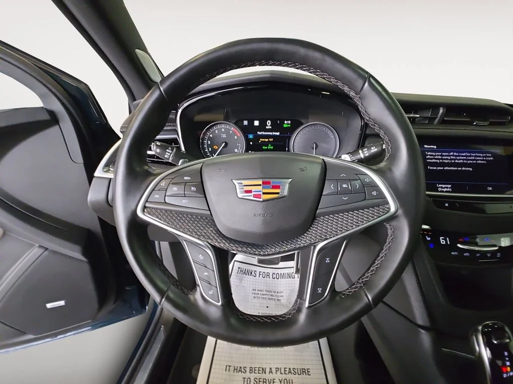 Used 2025 Emerald Lake Metallic Cadillac Sport image 13