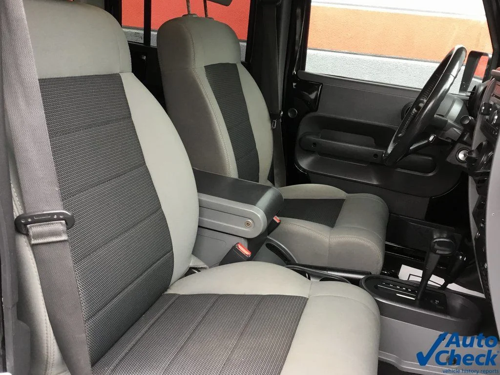 Used 2010 Black Jeep Unlimited Sport image 19