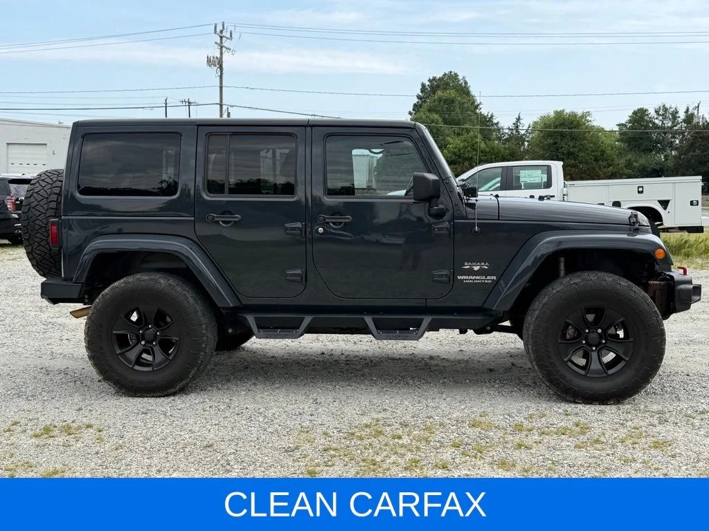Used 2017 Black Jeep Unlimited Sahara image 3