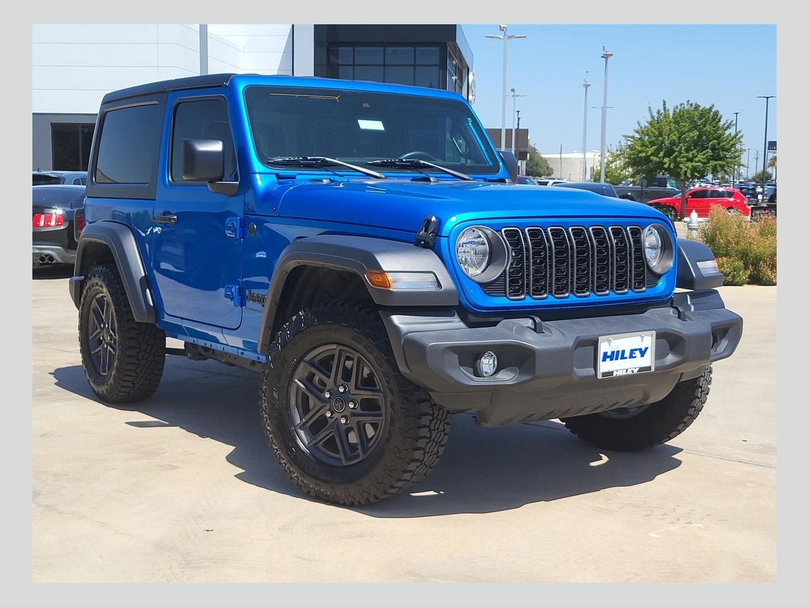Used 2024 Hydro Blue Pearl Coat Jeep Sport S image 1