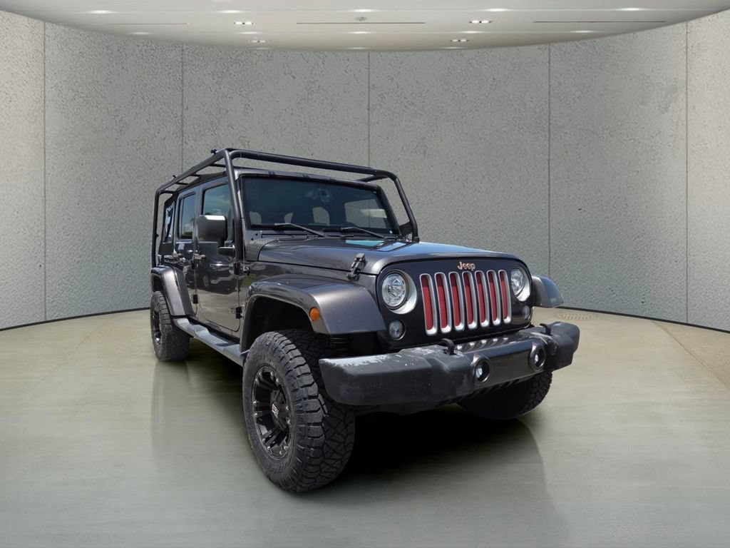 Used 2017 Granite Crystal Metallic Clearcoat Jeep Sahara image 14