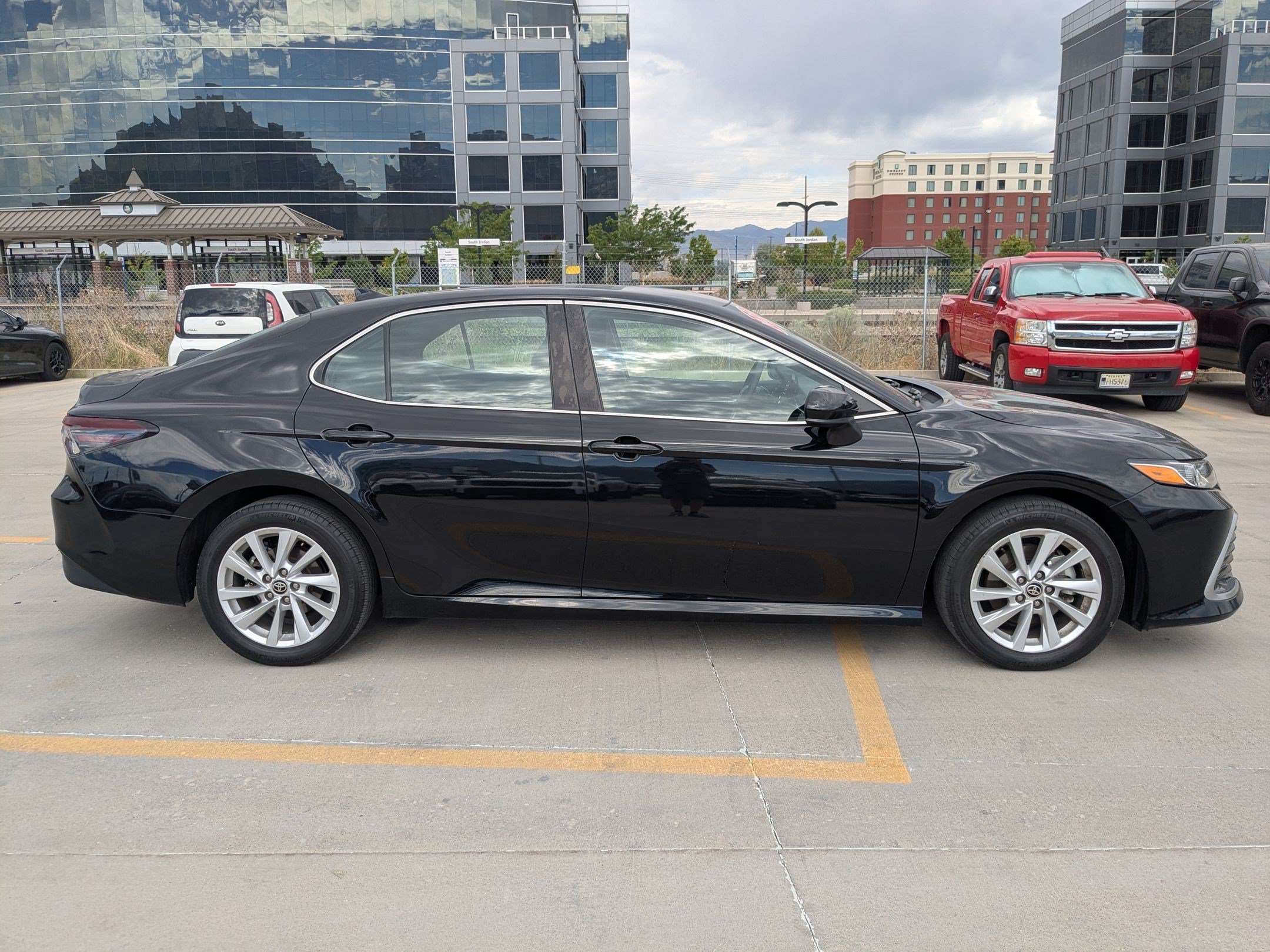 Used 2023 Midnight Black Metallic Toyota LE image 7