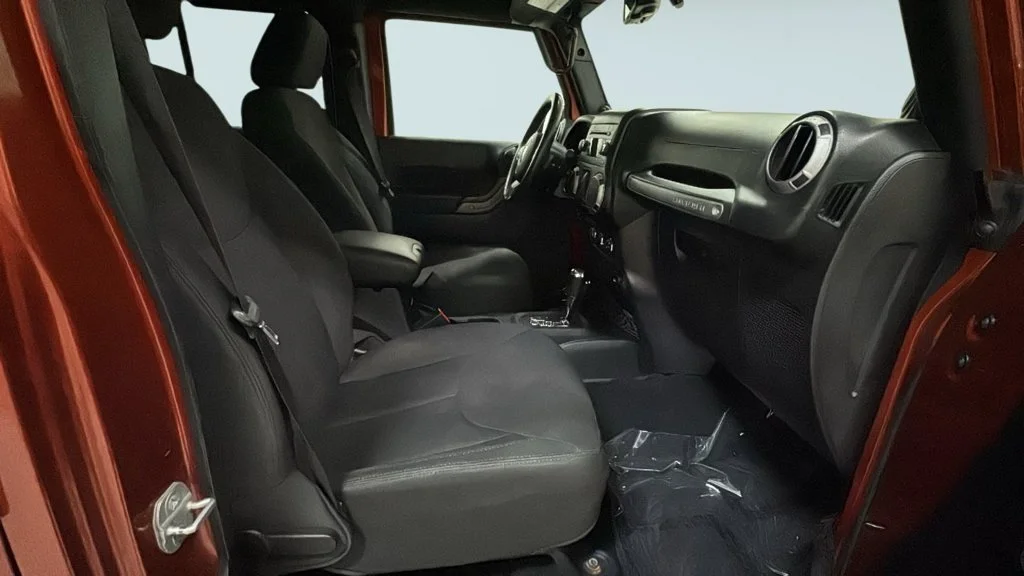 Used 2014 Orange Jeep Unlimited Sport image 8