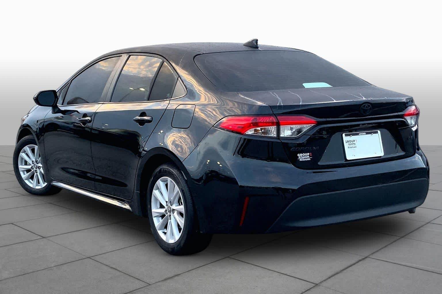 Used 2024 Midnight Black Metallic Toyota LE image 11