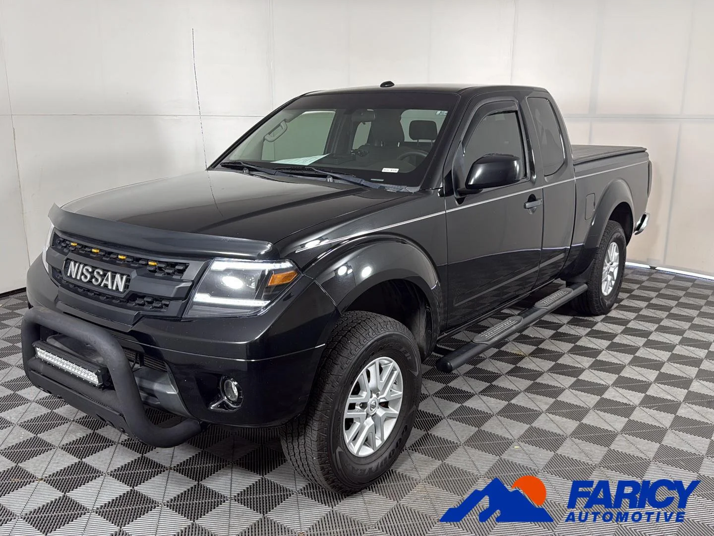 Used 2014 Super Black Nissan SV image 1