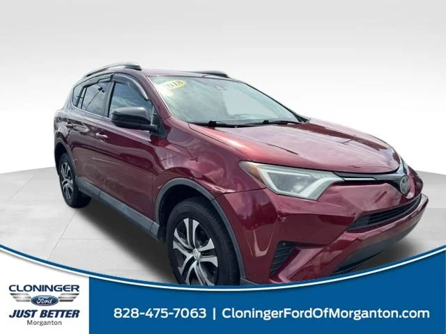 Used 2018 Red Toyota LE image 1