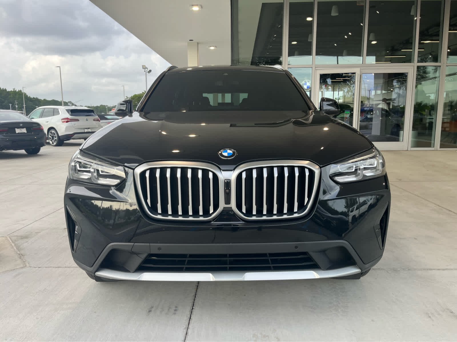 Used 2023 Black Sapphire Metallic BMW sDrive30i image 2