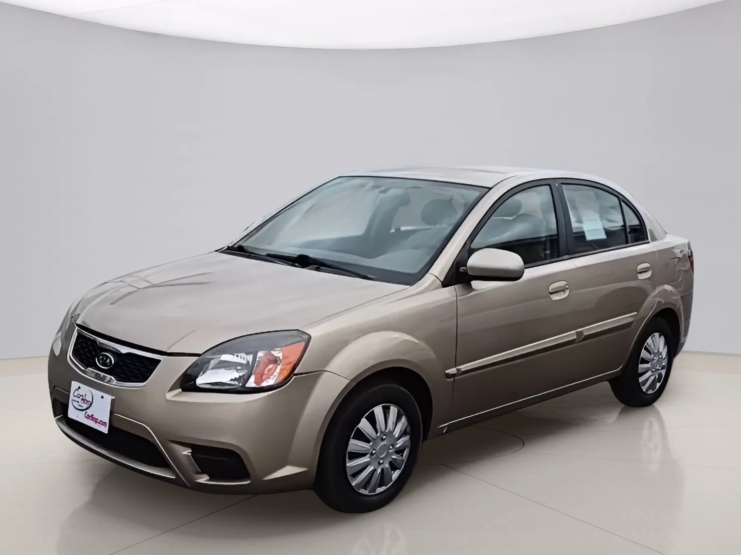 Used 2010 Gold Kia LX image 1