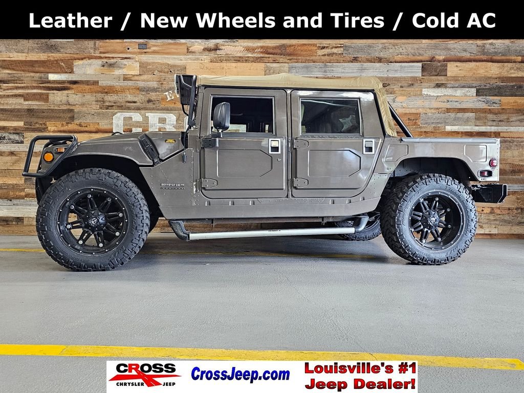 2000 Am General Hummer 4 Pass Open Top's photo