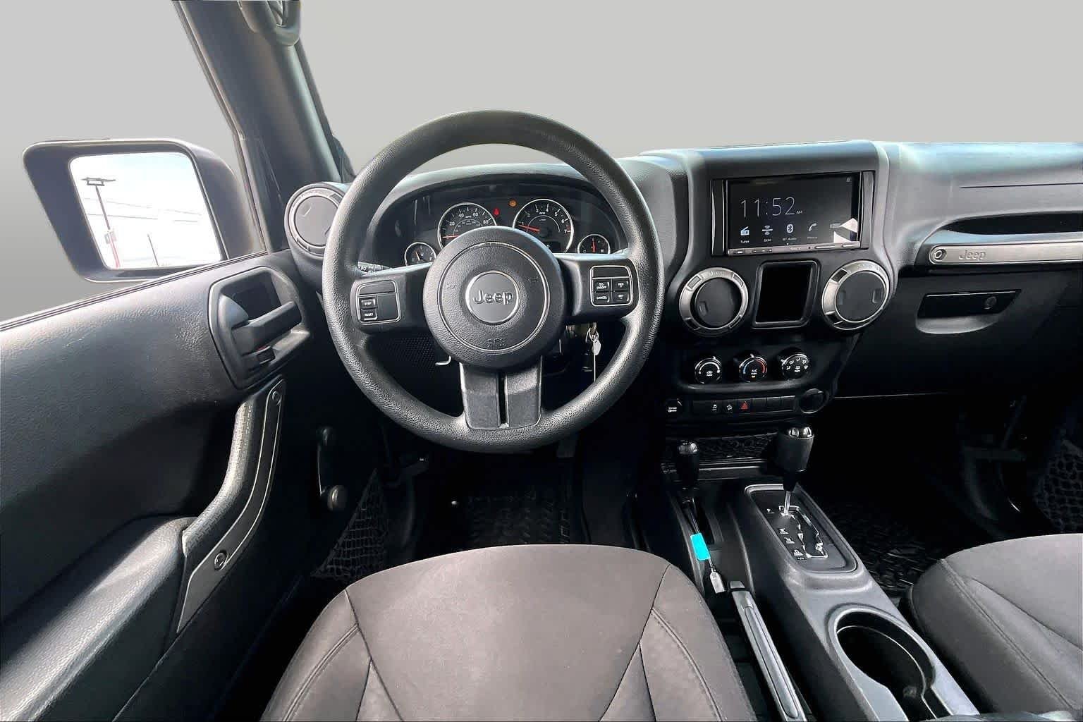 Used 2014 Black Clearcoat Jeep Sport image 6