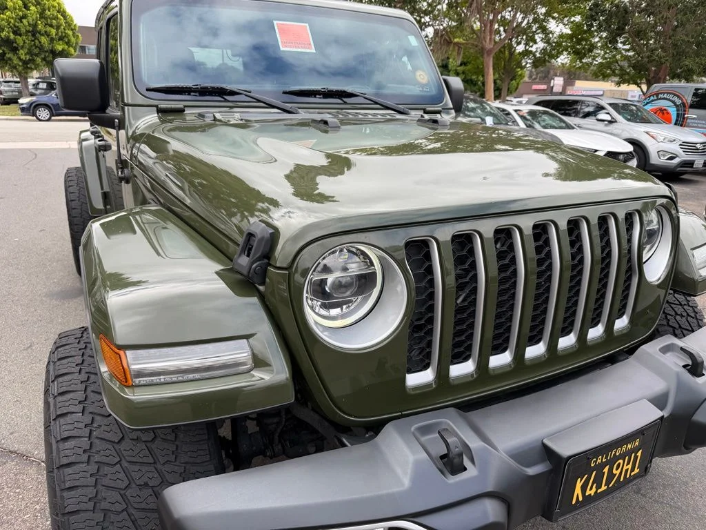 Used 2021 Green Jeep Unlimited Sahara 4xe image 1