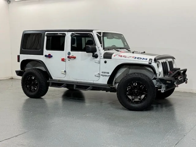 Used 2014 Jeep Wrangler Unlimited Sport with VIN 1C4BJWDG0EL120239 for sale in Middlesboro, KY