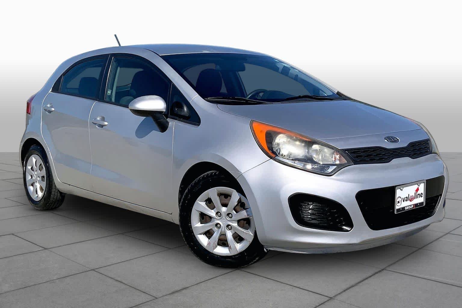Used 2012 Bright Silver Kia LX image 3