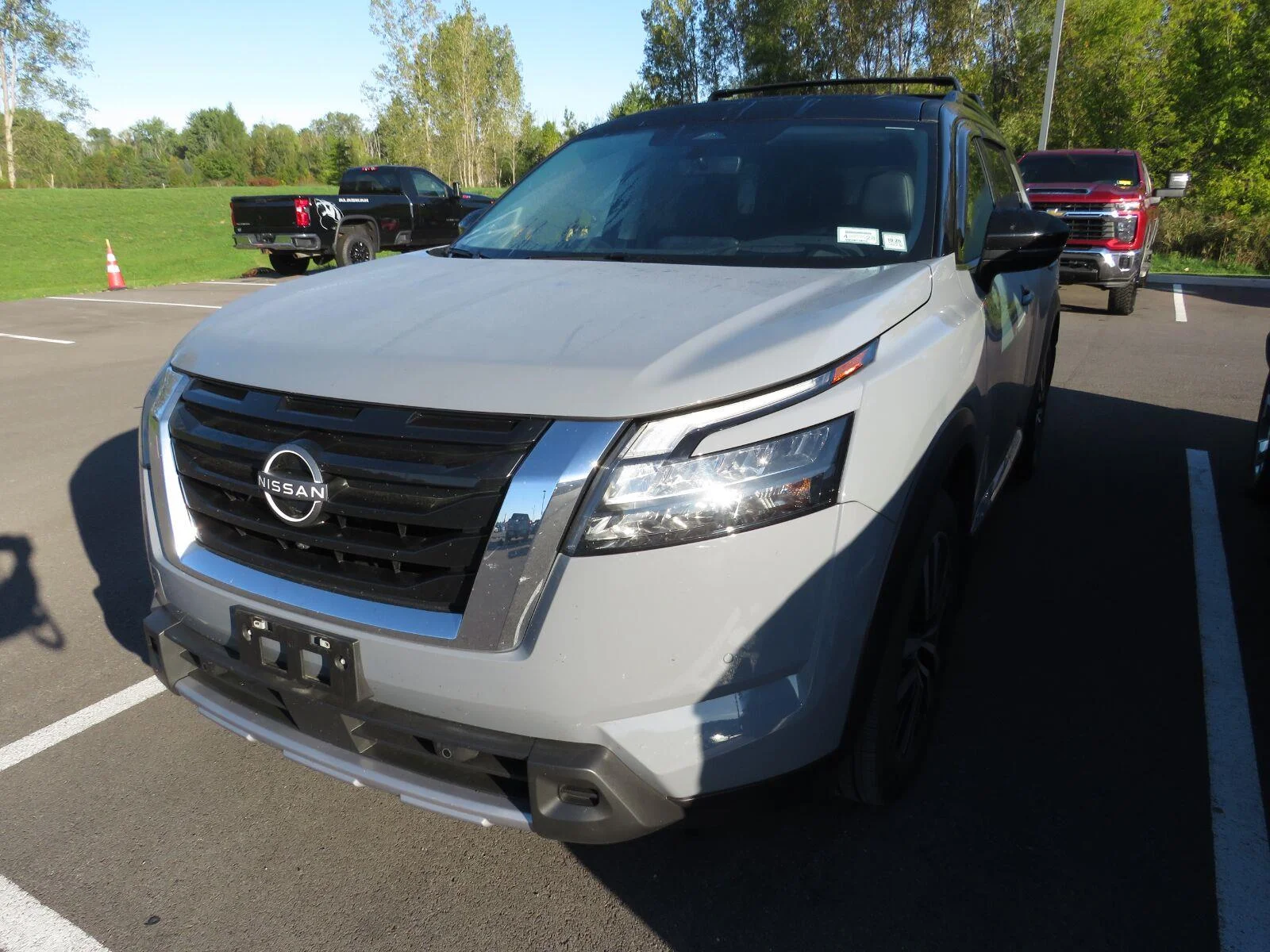 Used 2025 Solid Gray/Super Black Nissan Platinum image 4