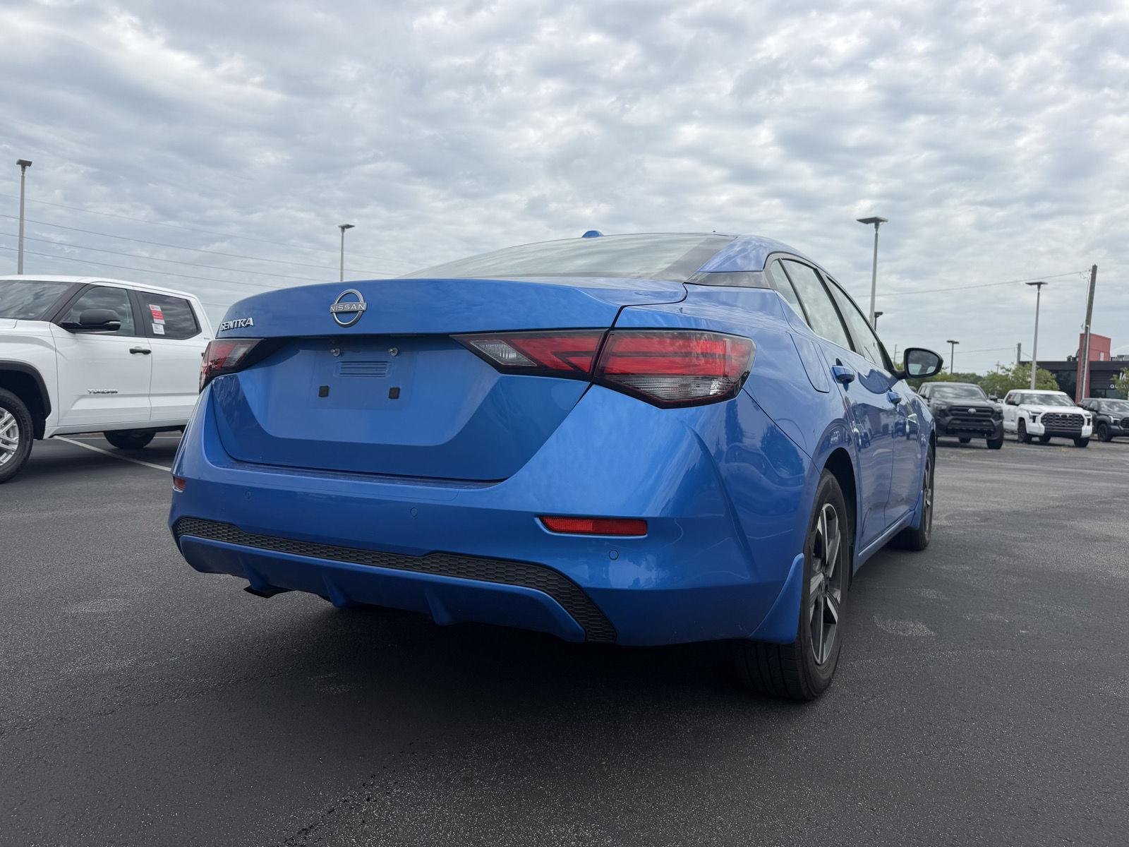 Used 2025 Electric Blue Metallic Nissan SV image 7