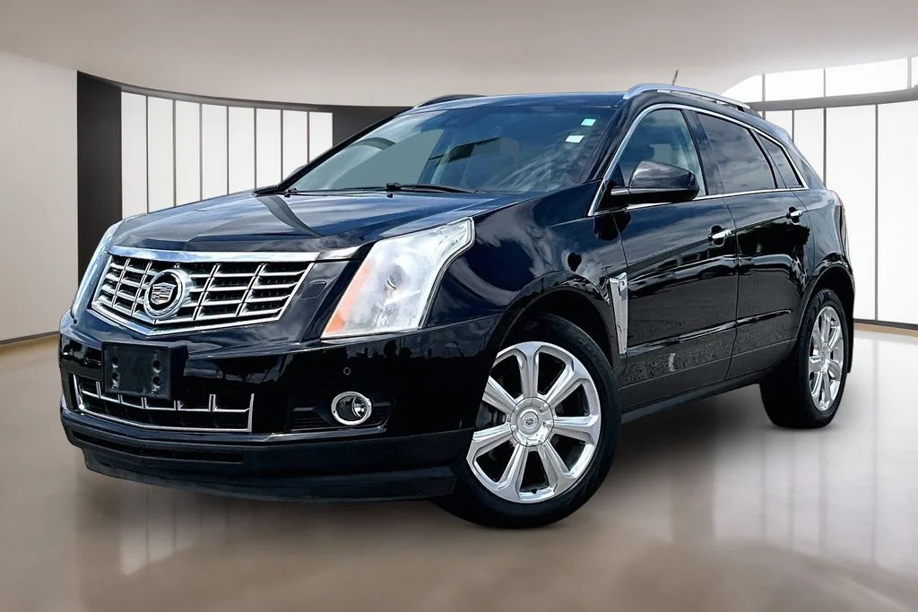 Used 2013 Black Cadillac Performance image 1