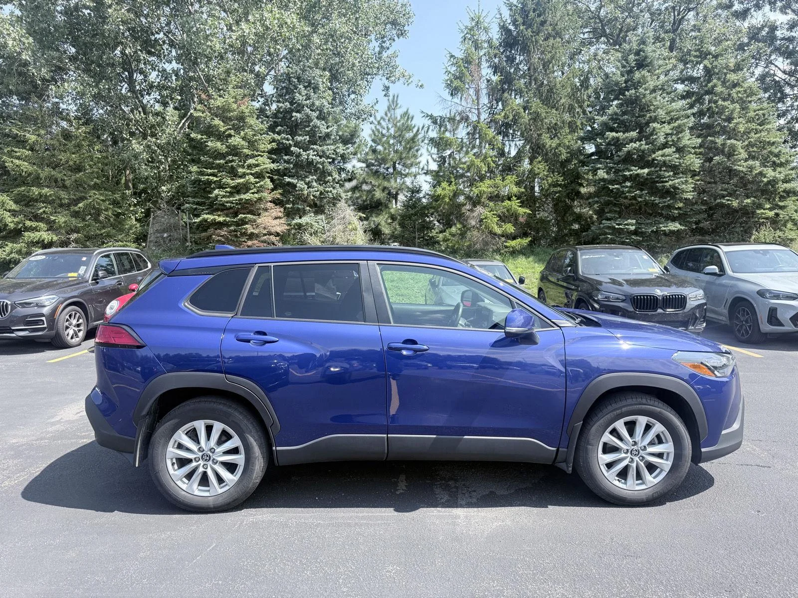 Used 2023 Blue Crush Metallic Toyota LE image 8