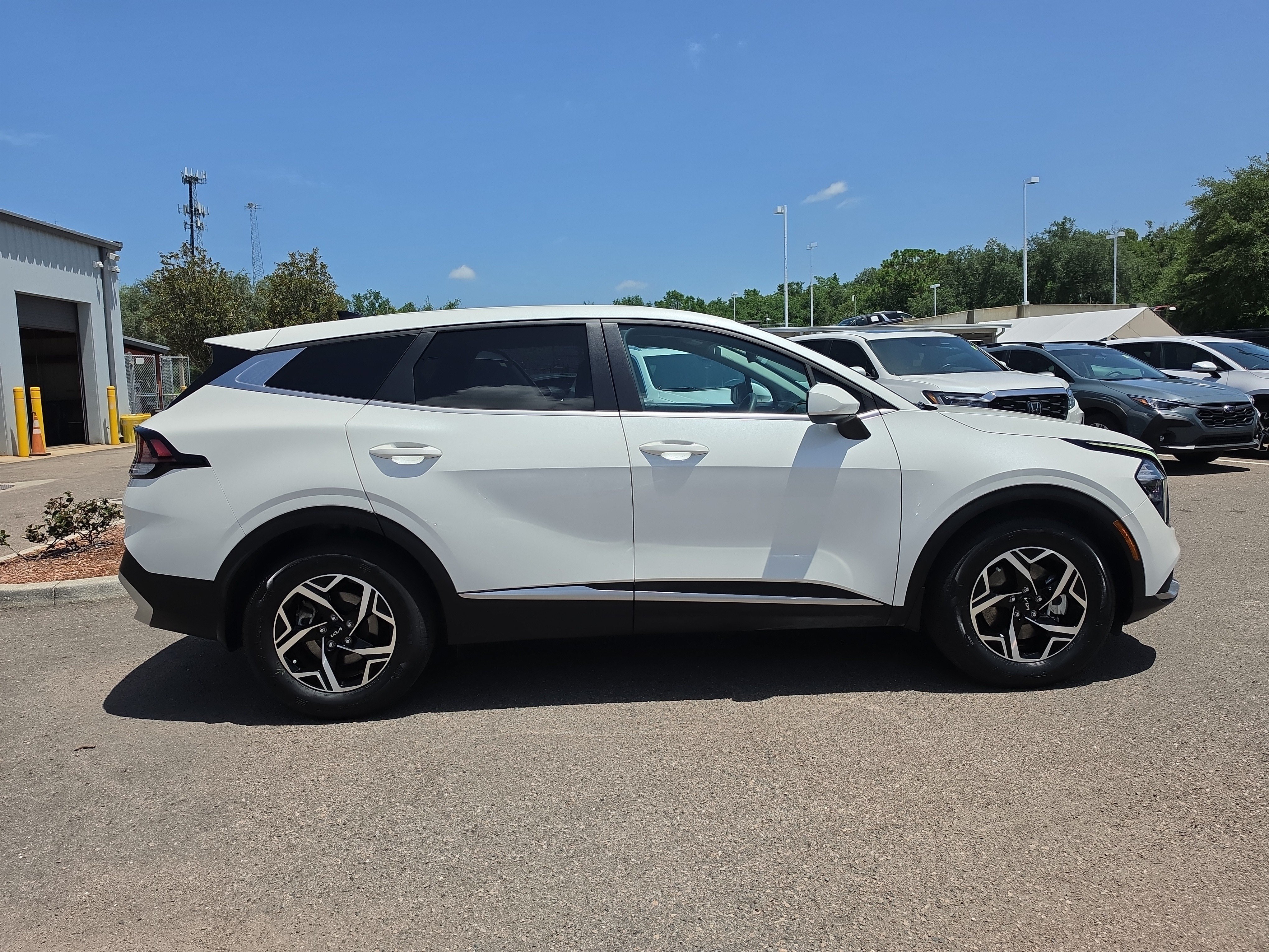 Certified Used 2023 Snow White Pearl Kia LX image 9