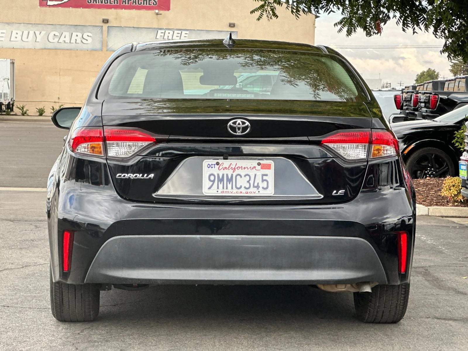 Used 2024 Black Toyota LE image 5