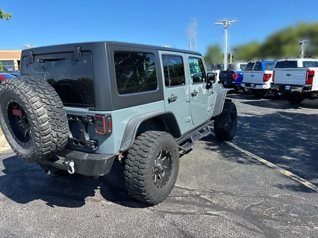 Used 2015 Gray Jeep Unlimited Sport image 13