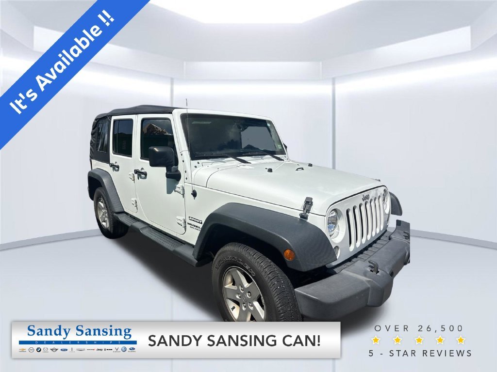Used 2015 White Jeep Unlimited Sport image 1