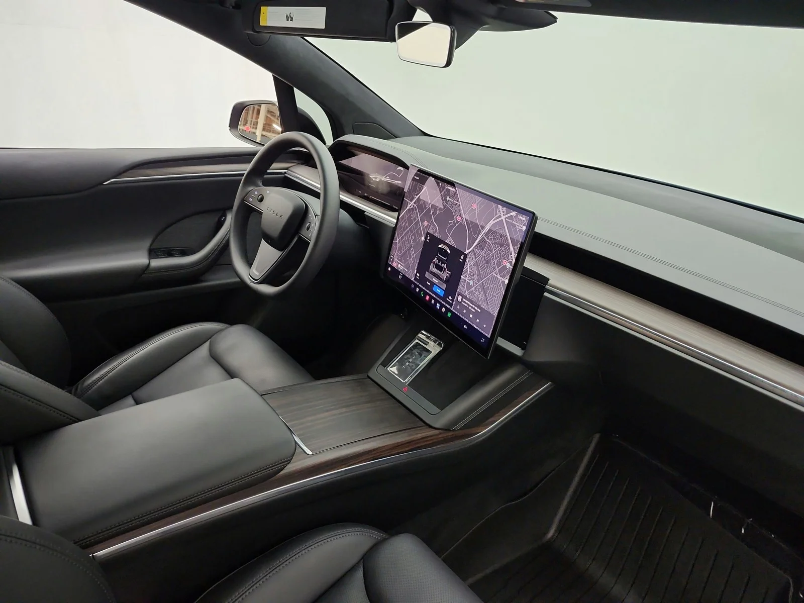 Used 2024 Solid Black Tesla AWD image 18