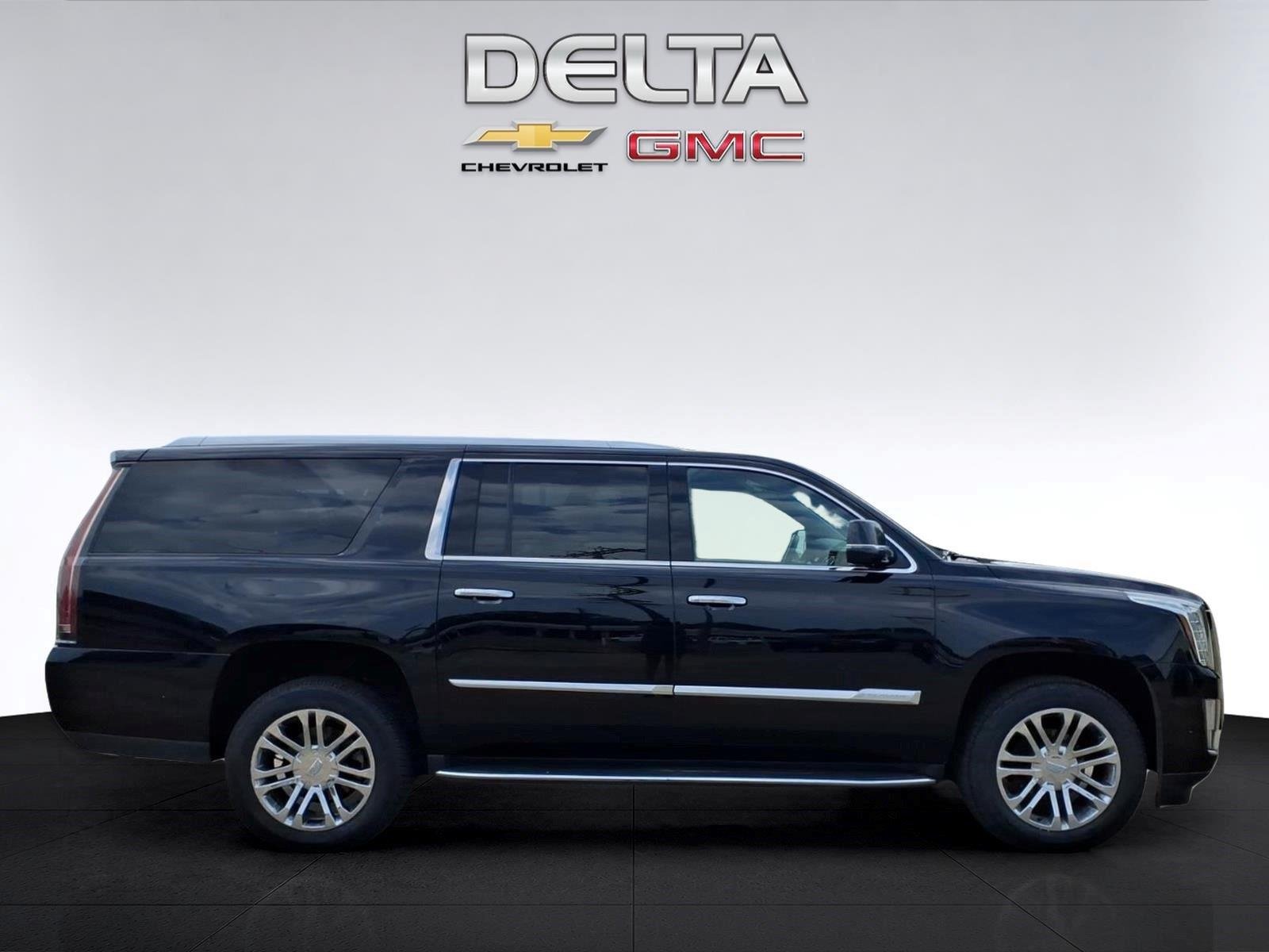 Used 2020 Black Raven Cadillac SUV image 6