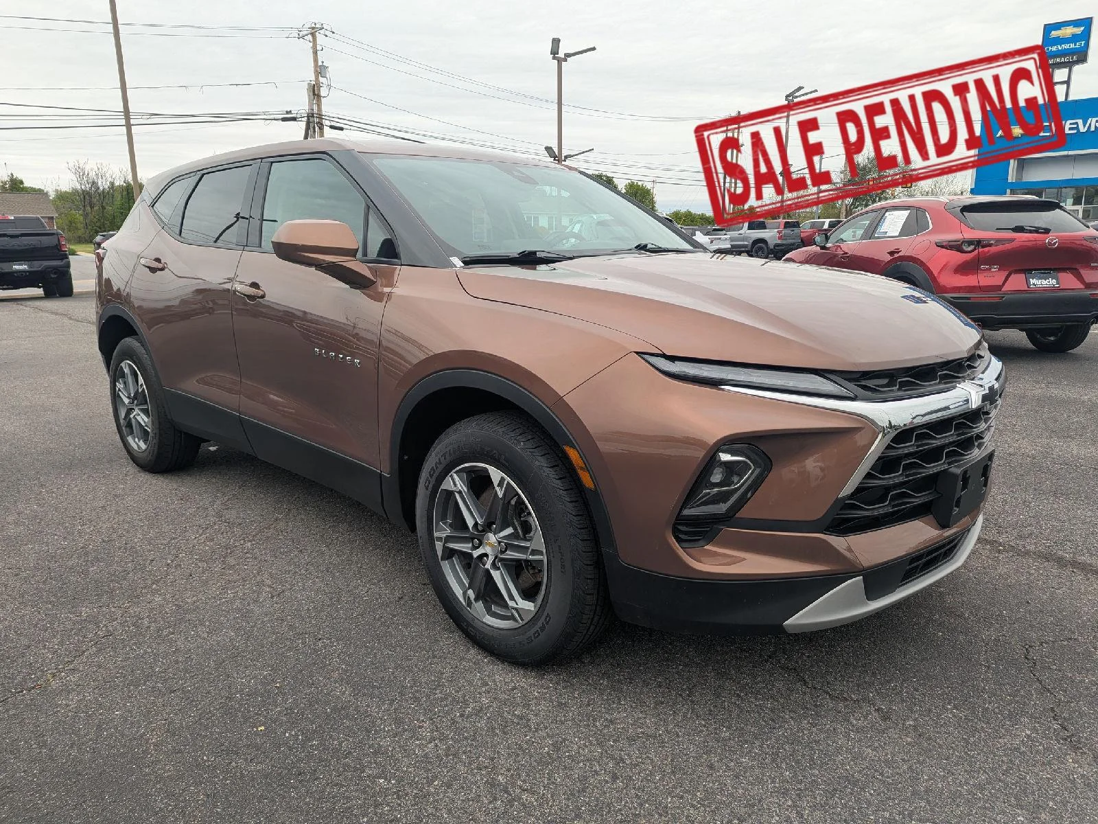 Used 2023 Copper Bronze Metallic Chevrolet 2LT image 1