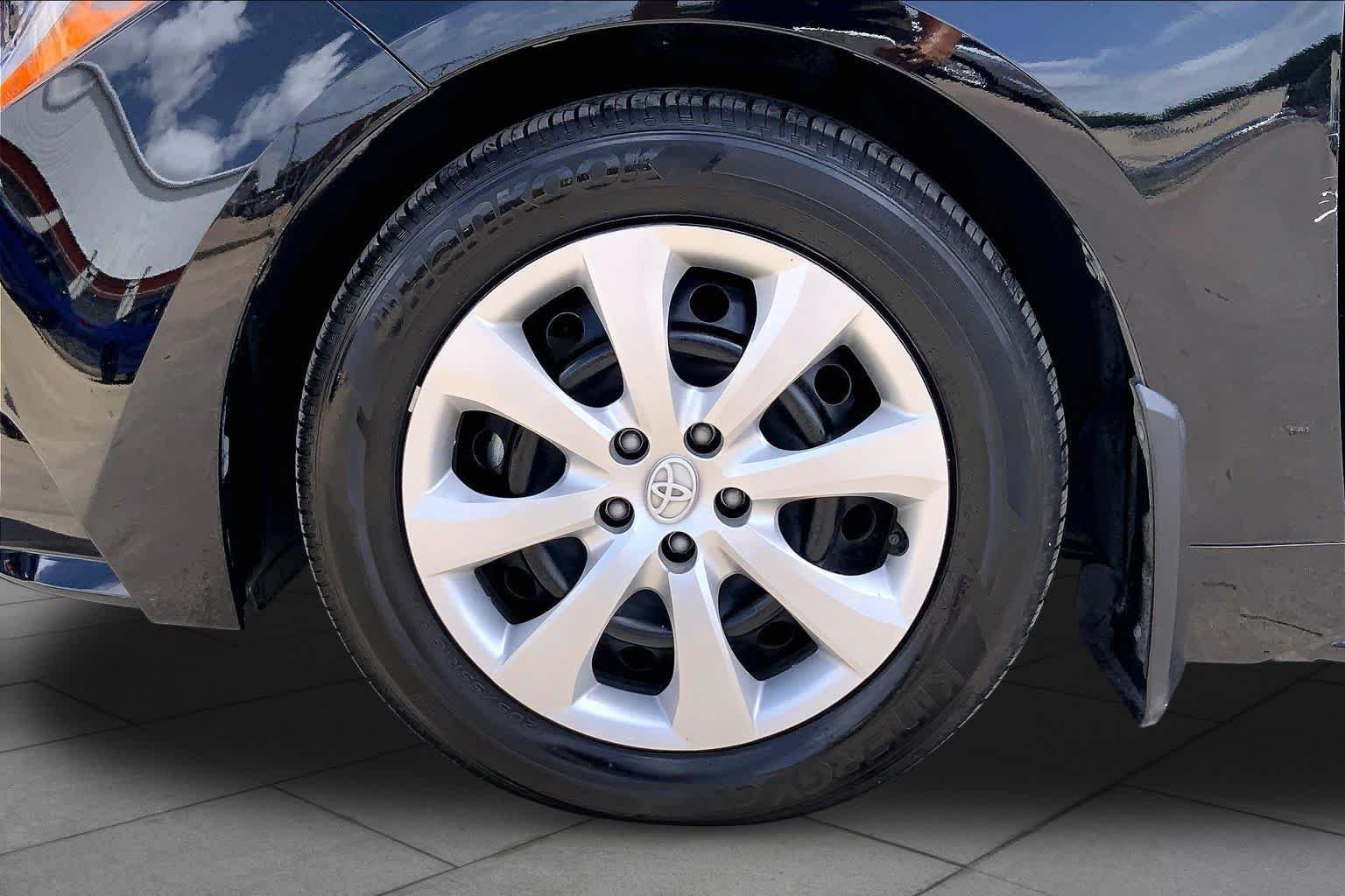 Used 2025 Midnight Black Metallic Toyota LE image 11