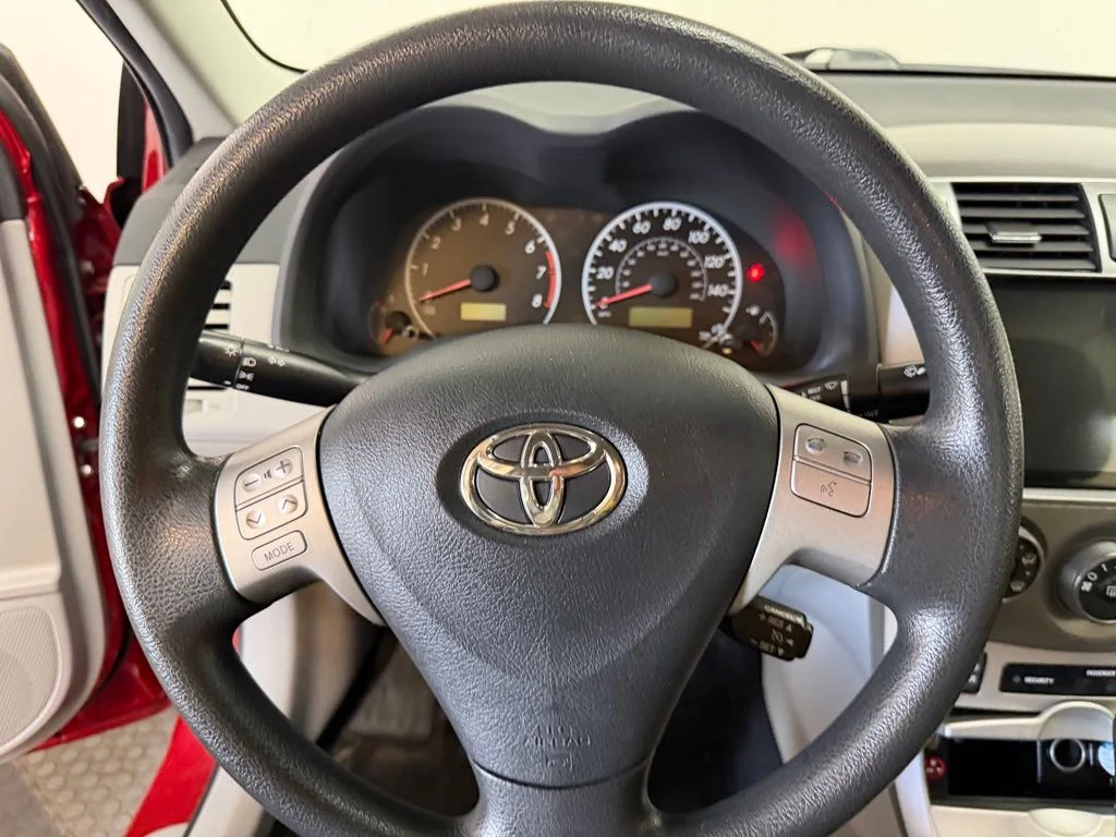Used 2012 Barcelona Red Metallic Toyota LE image 22