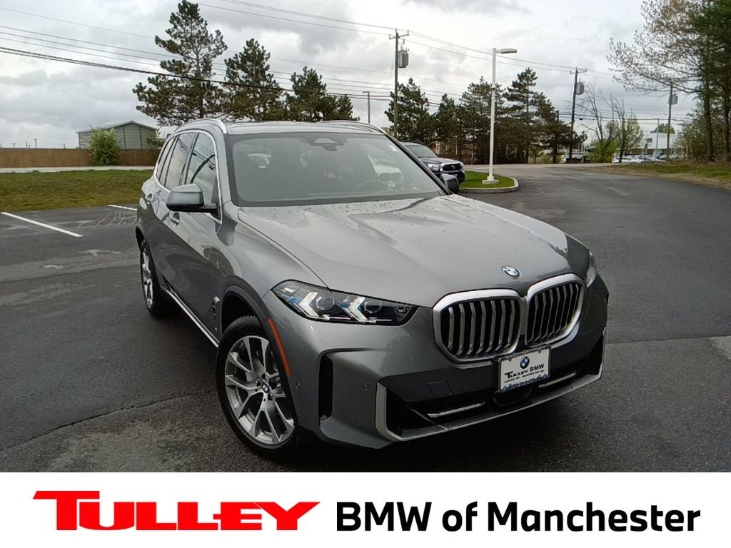 Used 2026 Skyscraper Grey Metallic BMW xDrive40i image 1