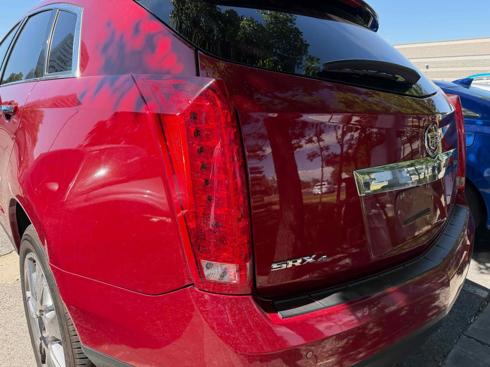 Used 2012 Crystal Red Tintcoat Cadillac Performance Collection image 9
