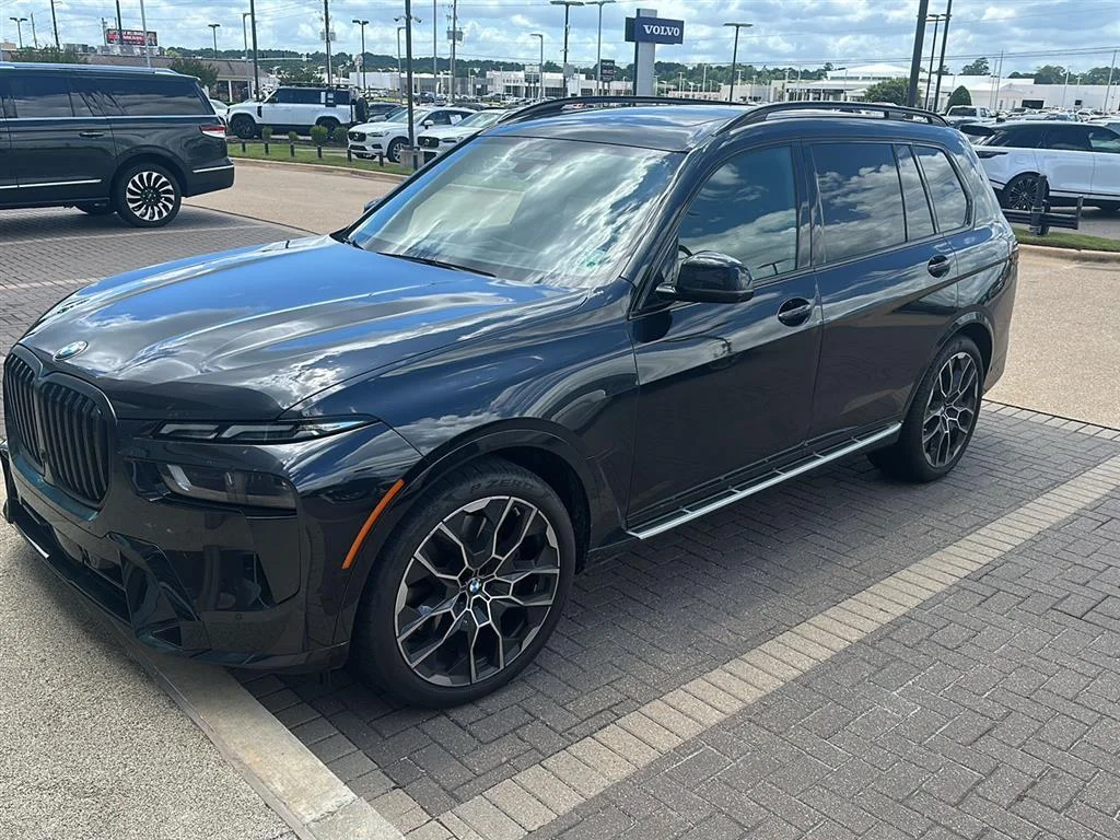 Used 2024 Black Sapphire Metallic BMW xDrive40i image 1
