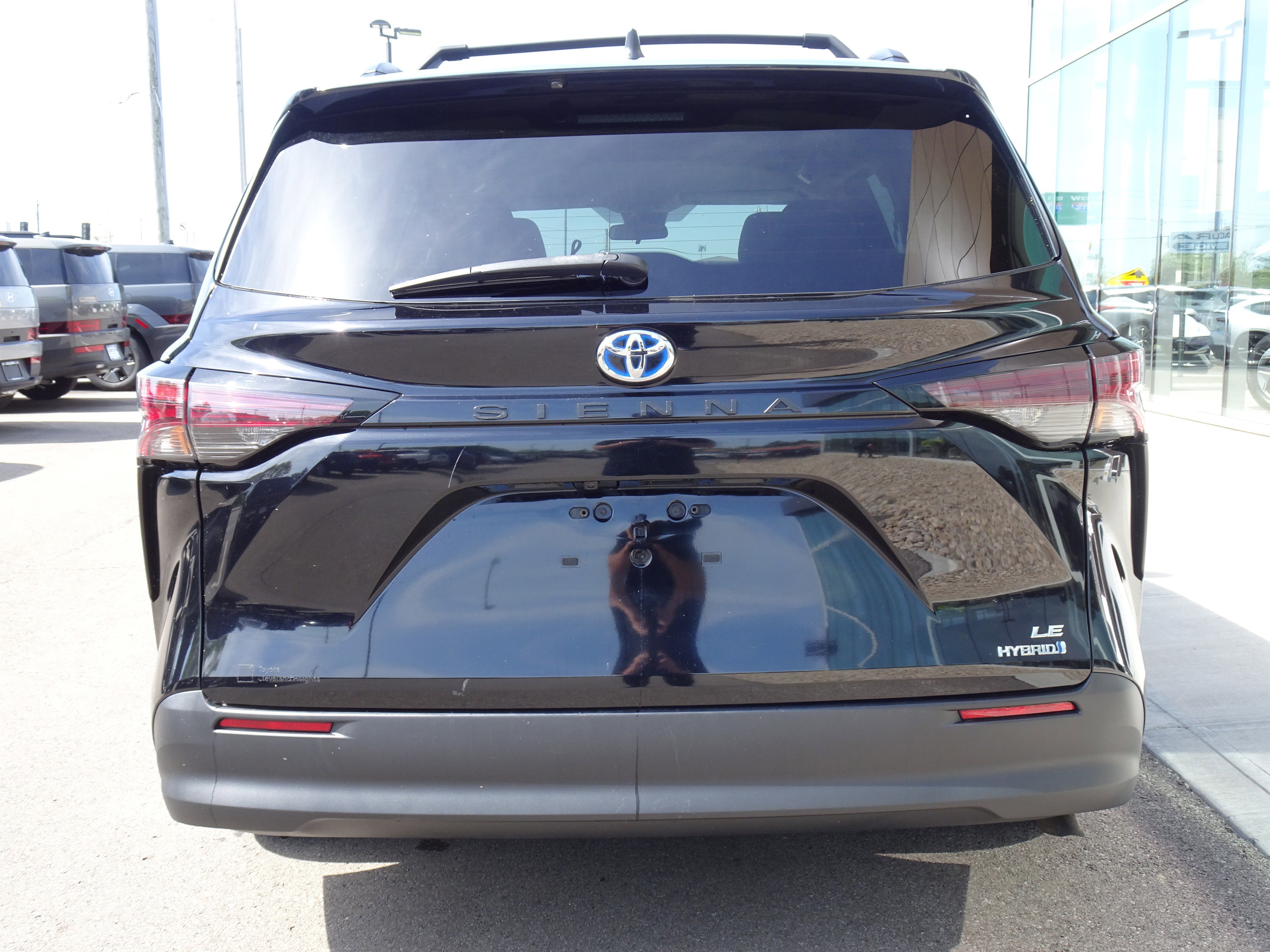 Used 2024 Midnight Black Metallic Toyota LE image 4