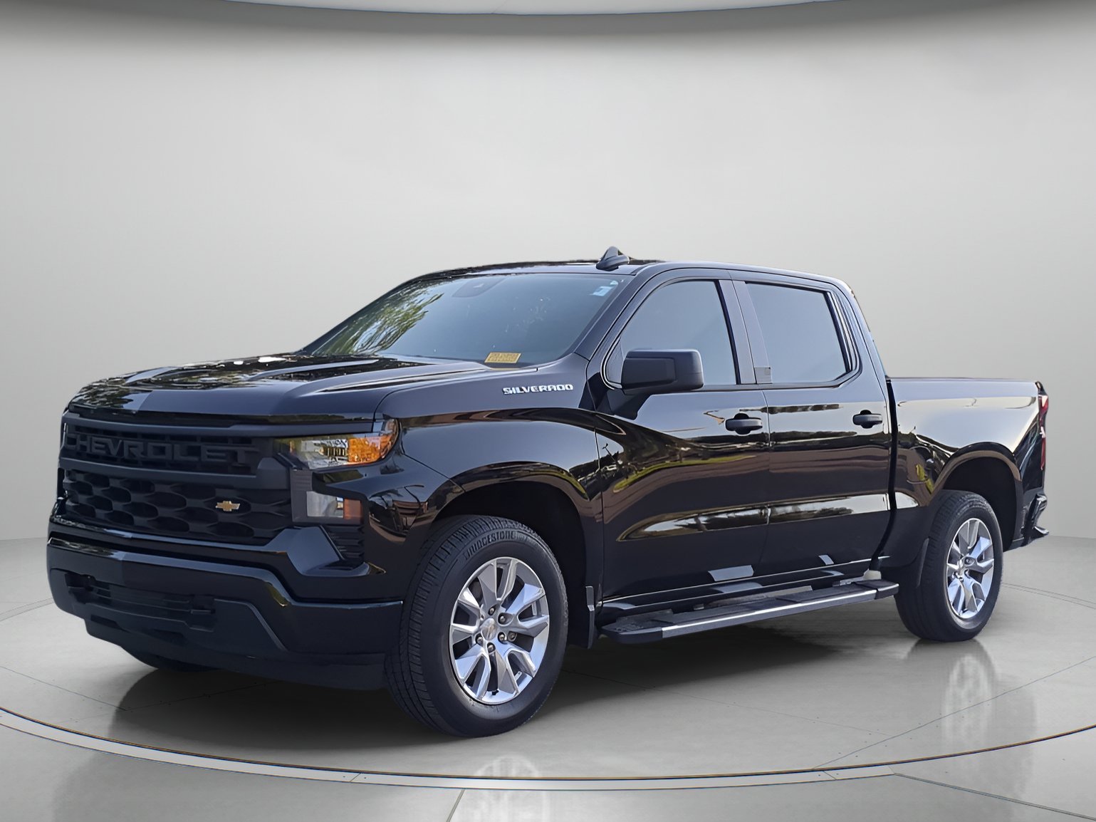 Used 2024 Black Chevrolet Custom Crew Cab Pickup image 1