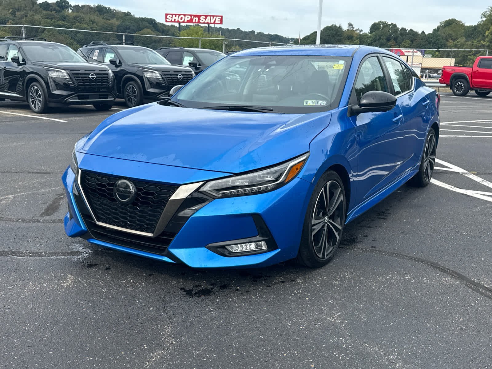 Certified Used 2023 Electric Blue Metallic Nissan SR image 2