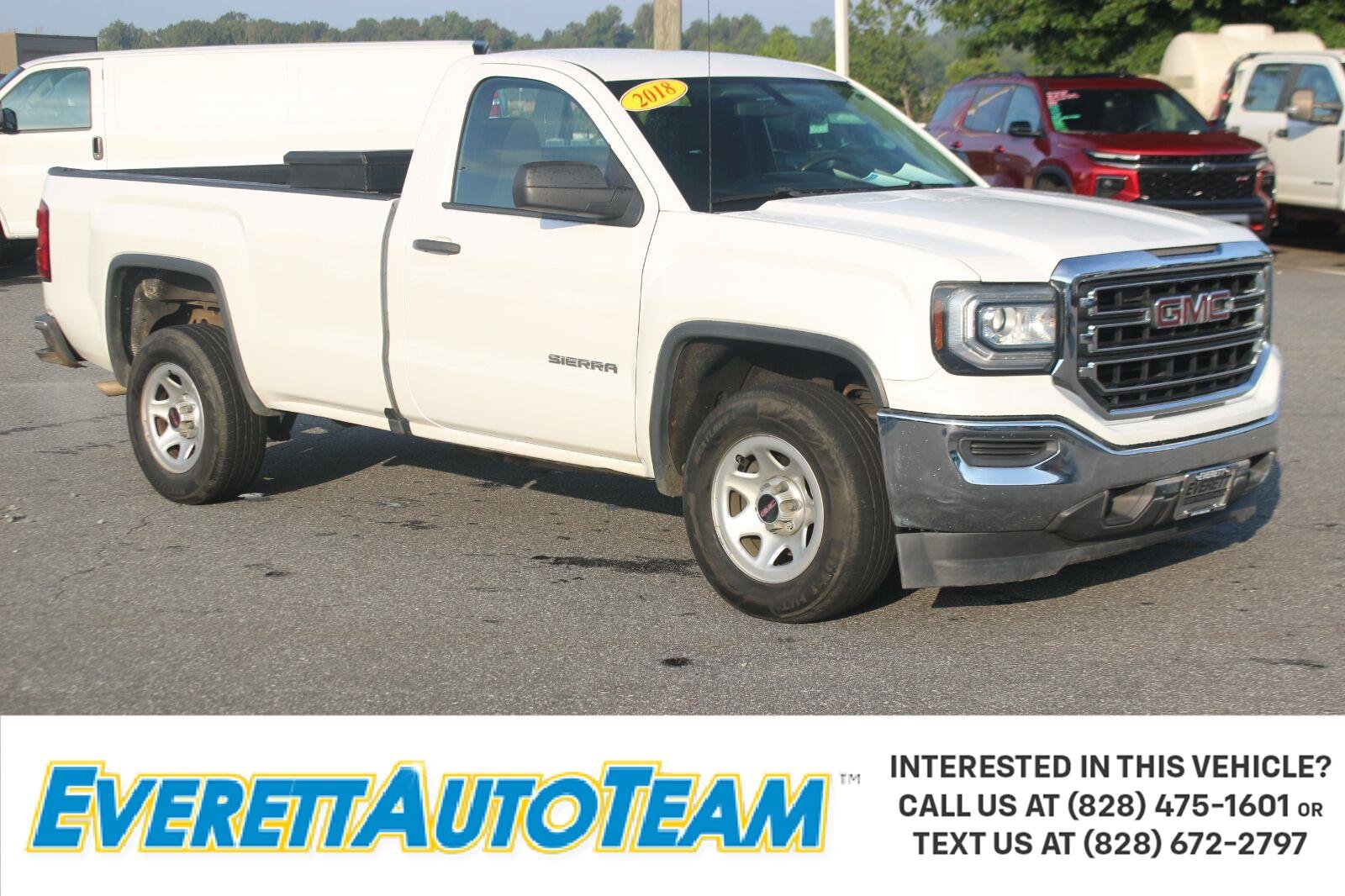 Used 2018 SUMMIT WHITE GMC 2WD Reg Cab 133.0" image 1