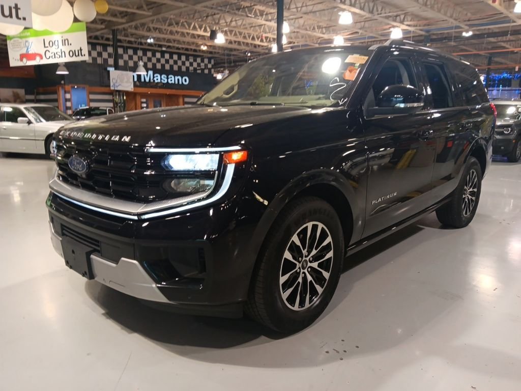 Used 2025 Black Ford Platinum image 1